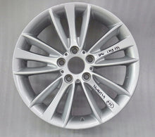 Load image into Gallery viewer, 1x Alufelge 18 Zoll 7.5" 5x120 49ET Glanz Silber 6779794 BMW 1 E88 E81 E82 E87 FEL5718403686uf