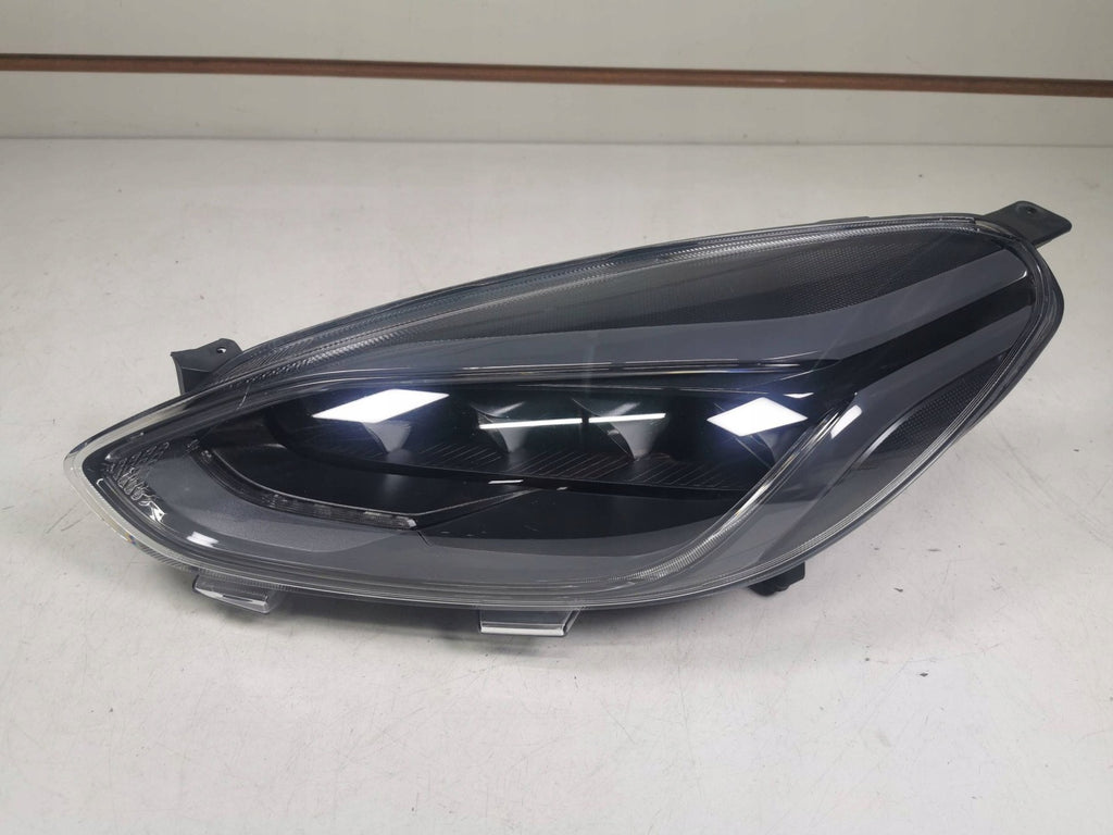 Frontscheinwerfer Ford Fiesta I H1BB13E015CF Links Scheinwerfer Headlight SCH1802570382er