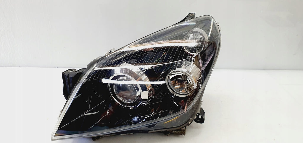 Frontscheinwerfer Opel Astra 1ZS008710-31 Xenon Links Scheinwerfer Headlight