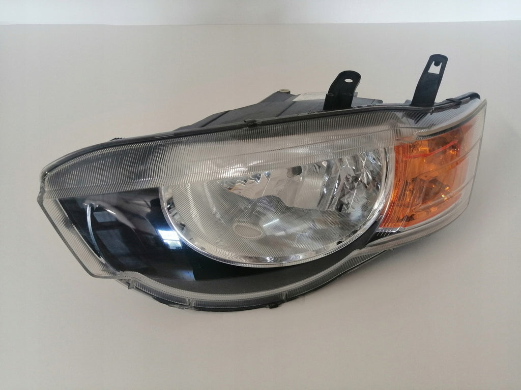 Frontscheinwerfer Mitsubishi Colt VI Links Scheinwerfer Headlight