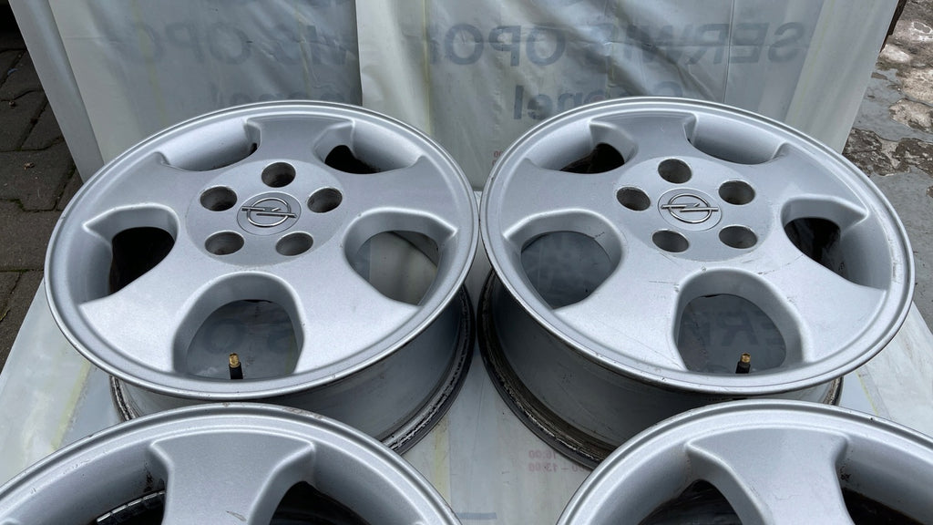 4x Alufelge 15 Zoll 6.0" 5x110 49ET Glanz Silber Opel Rim Wheel