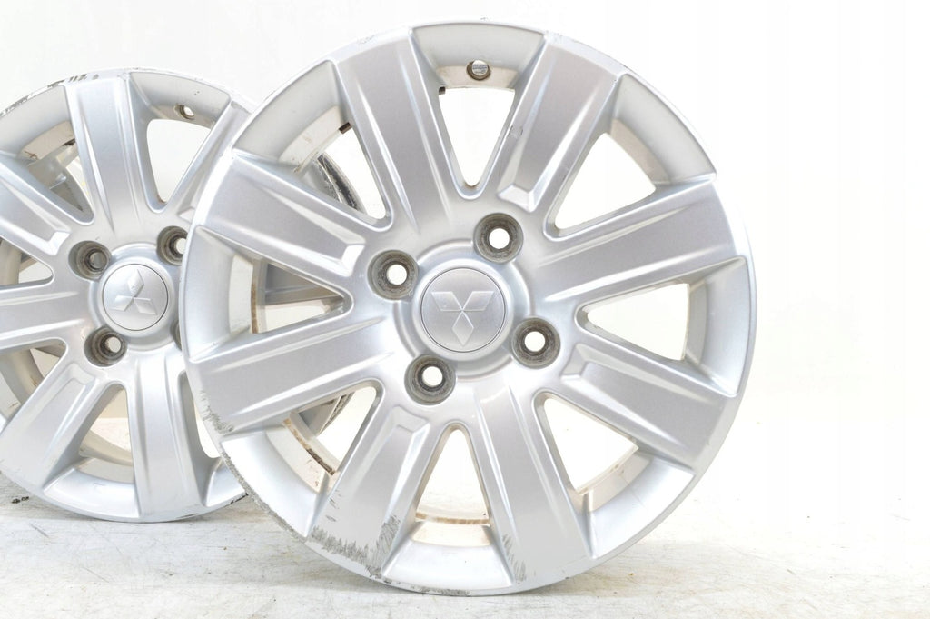4x Alufelge 15 Zoll 6.0" 4x114.3 46ET Glanz Silber Mitsubishi Colt I Rim Wheel FEL4605361325nq