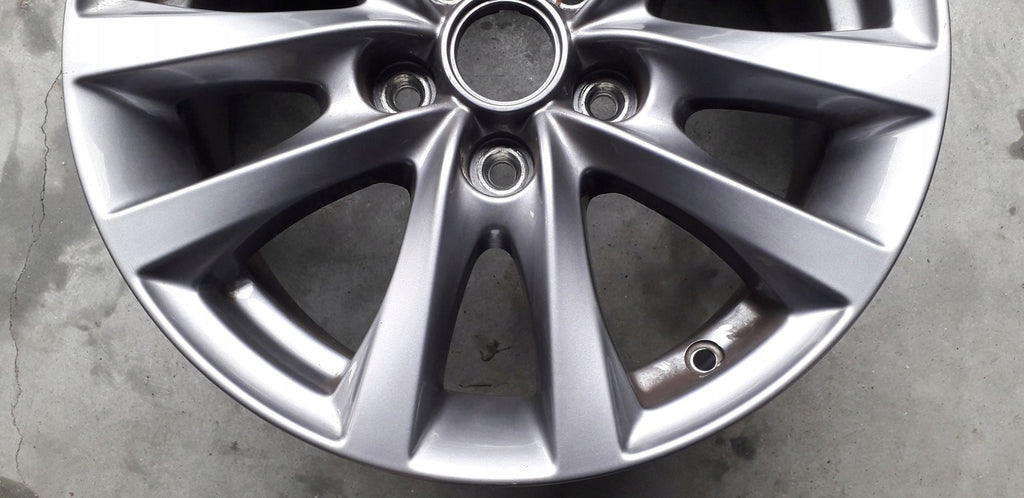 1x Alufelge 16 Zoll 6.5" 5x114.3 45ET Glanz Silber 9965N06560 Mazda 3 Rim Wheel