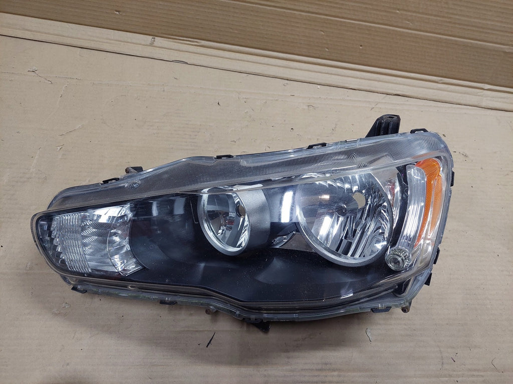Frontscheinwerfer Mitsubishi Outlander II Ein Stück (Rechts oder Links)