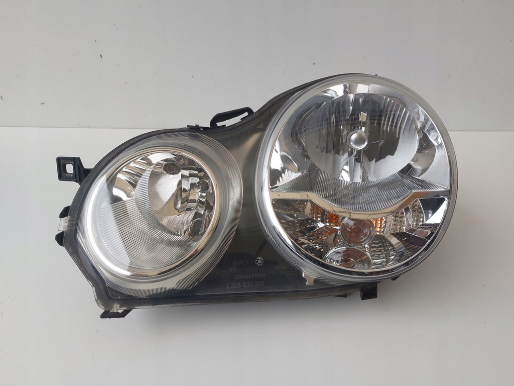 Frontscheinwerfer VW Polo IV 6Q1941007M Links Scheinwerfer Headlight