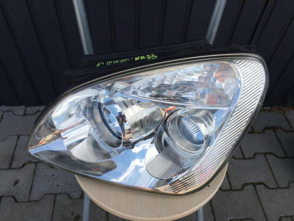 Frontscheinwerfer Kia Carens III Links Scheinwerfer Headlight