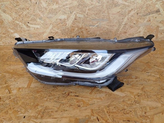 Frontscheinwerfer Toyota Yaris Links Scheinwerfer Headlight