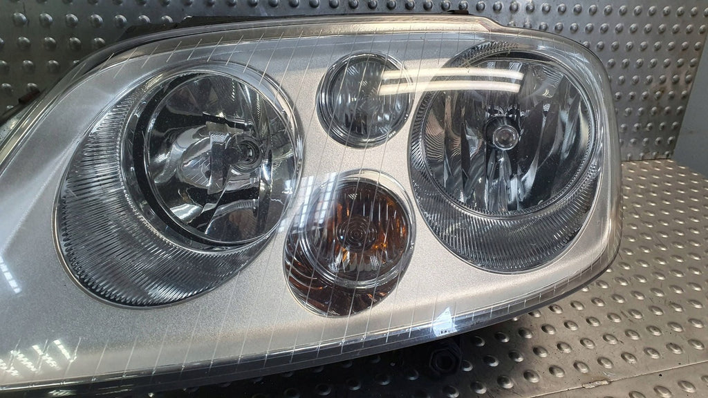 Frontscheinwerfer VW Touran 1T0941005F Links Scheinwerfer Headlight