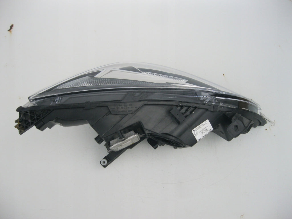 Frontscheinwerfer Opel Astra LE10A6242 Xenon Links Scheinwerfer Headlight