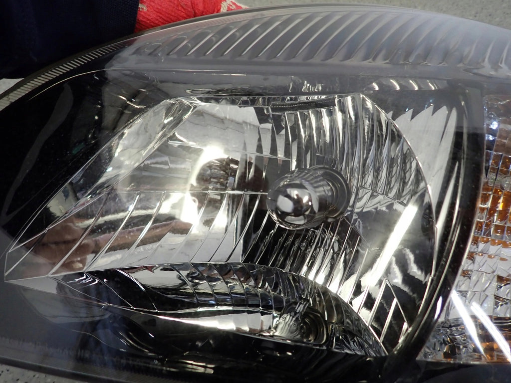Frontscheinwerfer Kia Rio II Links Scheinwerfer Headlight SCH5605317179li