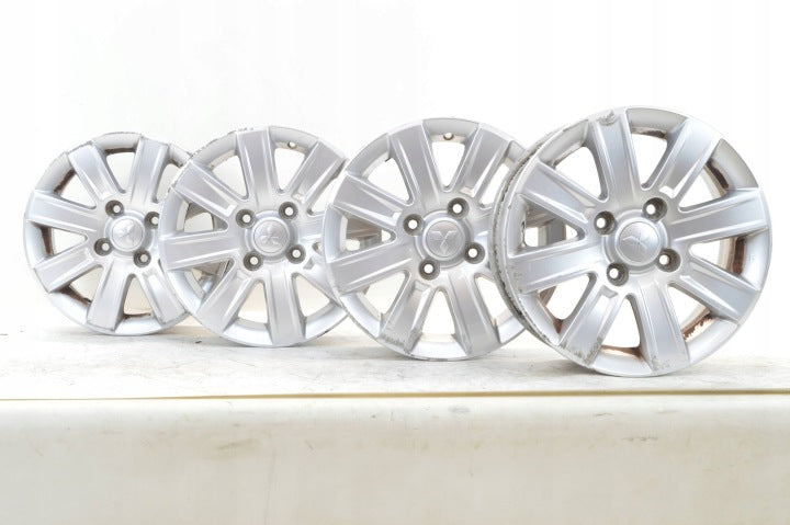 4x Alufelge 15 Zoll 6.0" 4x114.3 46ET Glanz Silber Mitsubishi Colt I Rim Wheel FEL4605361325nq