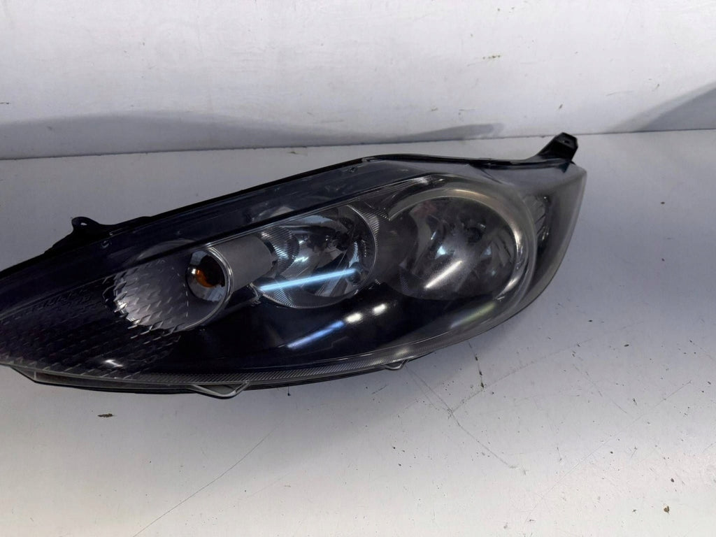 Frontscheinwerfer Ford Fiesta I 8A6113W030AE 1EJ24704501 Links Headlight SCH3039285396wj