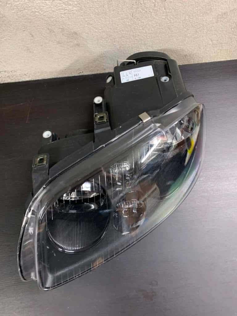 Frontscheinwerfer VW Touran Caddy I Links Scheinwerfer Headlight SCH6380839814bg