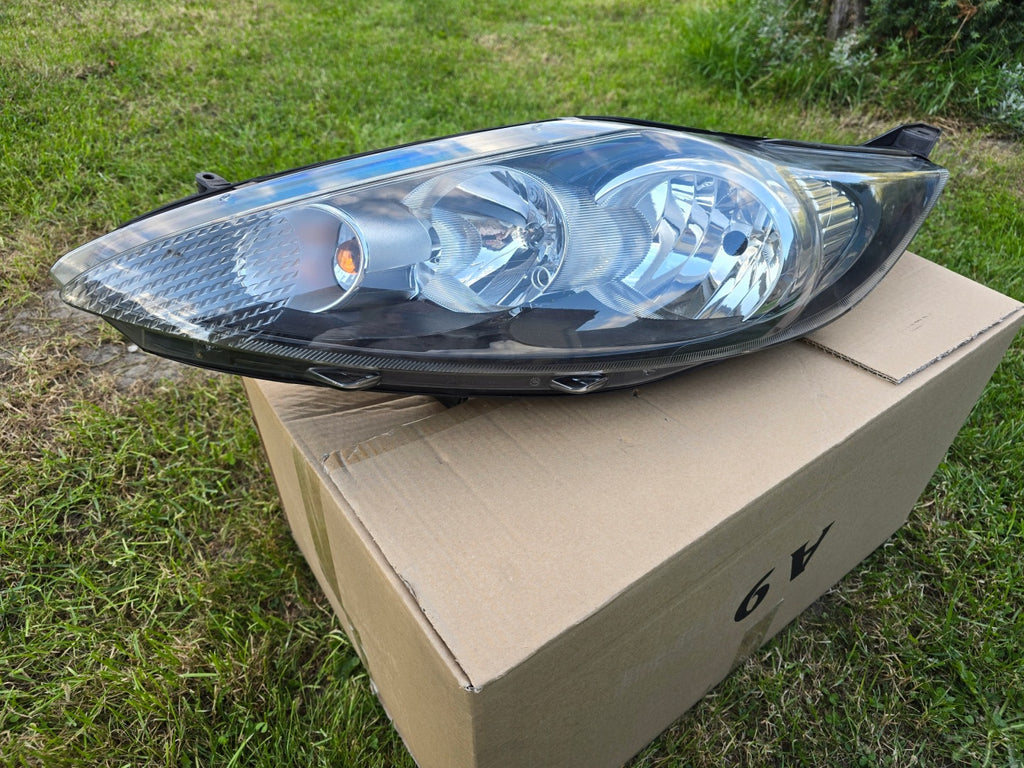 Frontscheinwerfer Ford Fiesta I 1EJ24704501 8A6113W030AF Links Headlight SCH7644227574nl