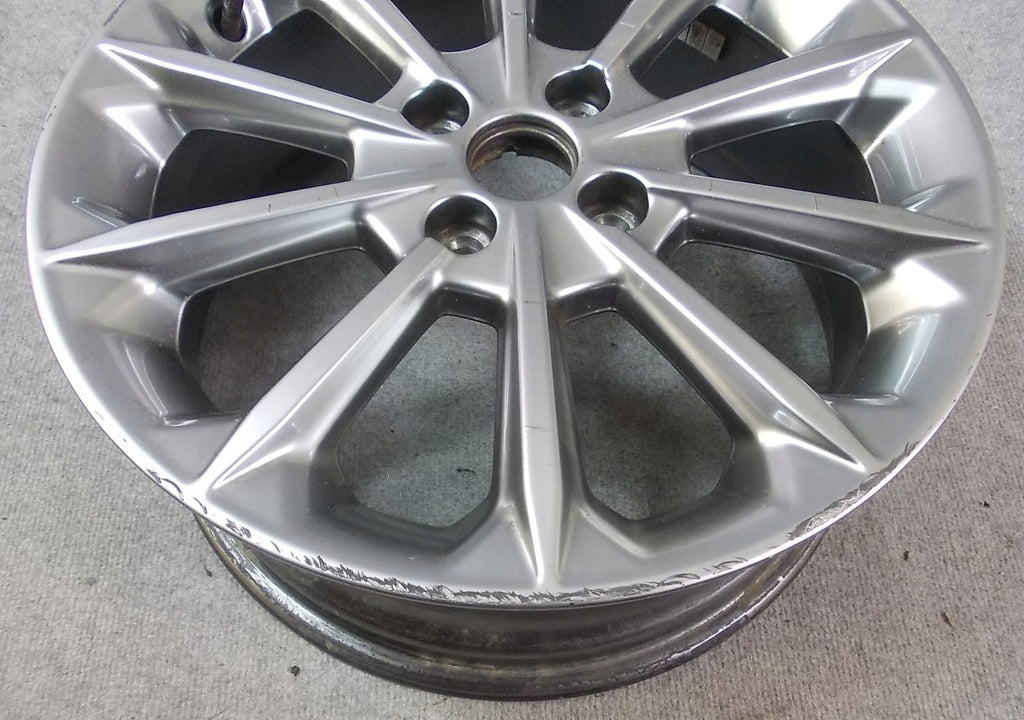 1x Alufelge 17 Zoll 7.0" 4x108 47,5ET Glanz Silber H1BC-1007-D1A Ford Fiesta