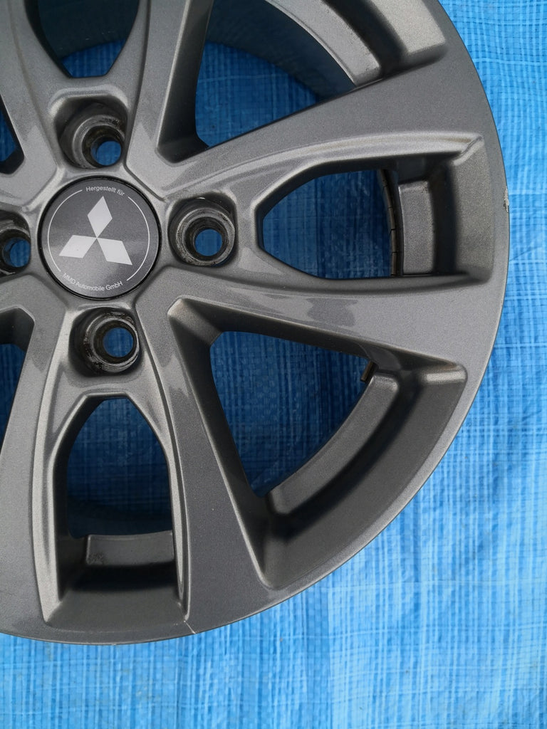 1x Alufelge 14 Zoll 5.5" 4x100 40ET MMDA01-554 Mitsubishi Mirage Space Star