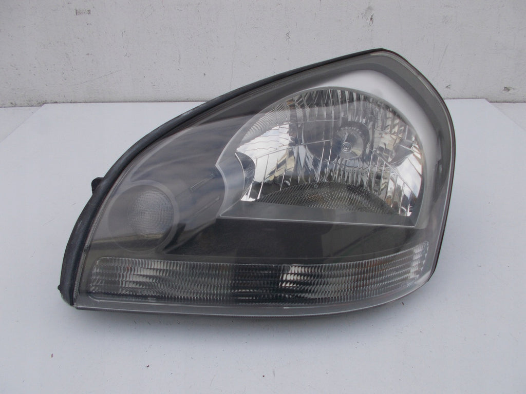 Frontscheinwerfer Hyundai Tucson 92101-2EXXX Links Scheinwerfer Headlight