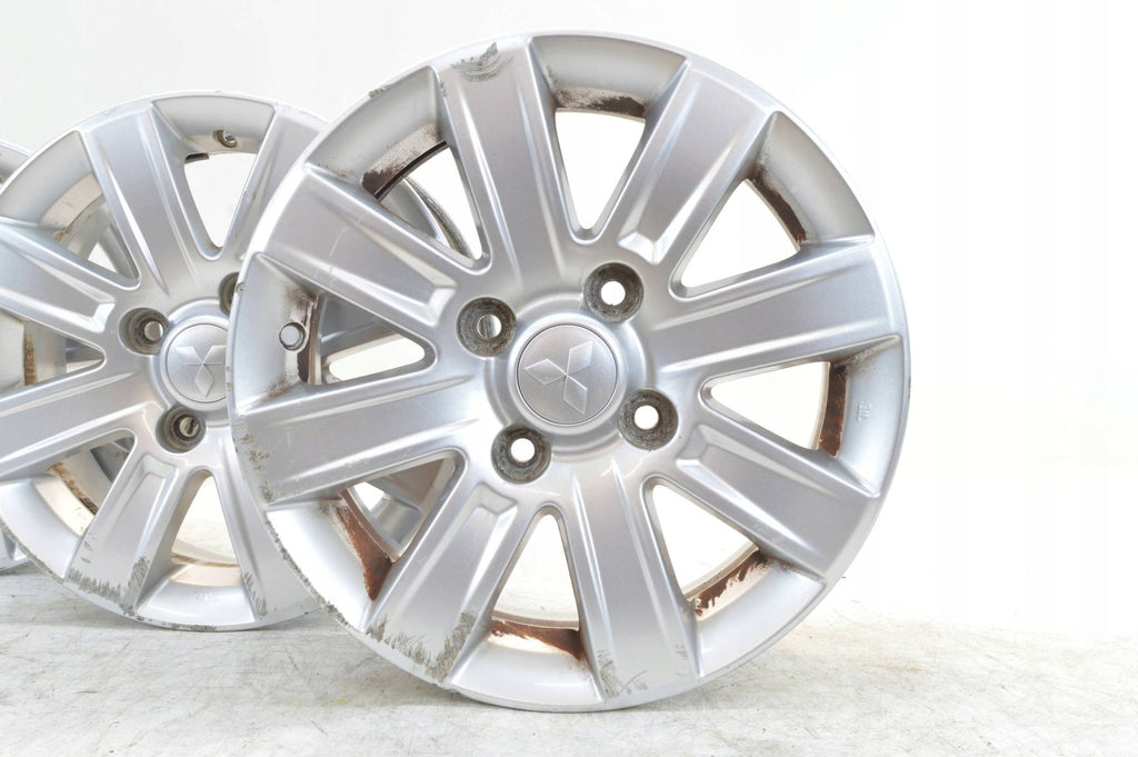 4x Alufelge 15 Zoll 6.0" 4x114.3 46ET Glanz Silber Mitsubishi Colt I Rim Wheel FEL4605361325nq