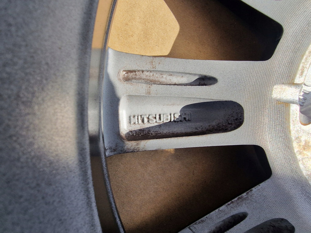 1x Alufelge 15 Zoll 5.0" 4x100 Mitsubishi I W Rim Wheel FEL1846221464nt