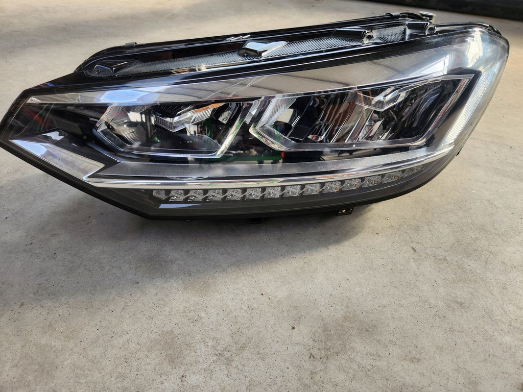 Frontscheinwerfer VW Touran Links Scheinwerfer Headlight