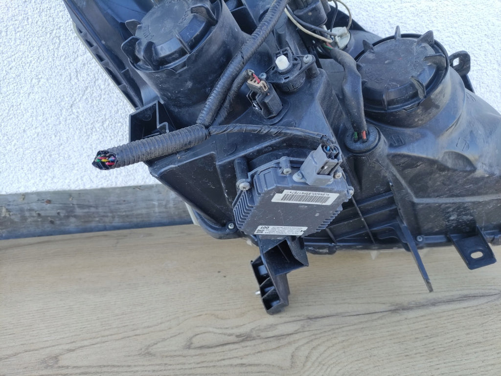 Frontscheinwerfer Renault Koleos I Links Scheinwerfer Headlight SCH2041290339ye
