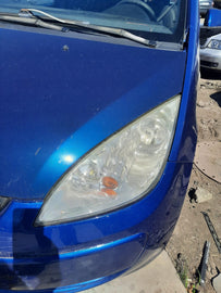 Frontscheinwerfer Mitsubishi Colt VI Links Scheinwerfer Headlight