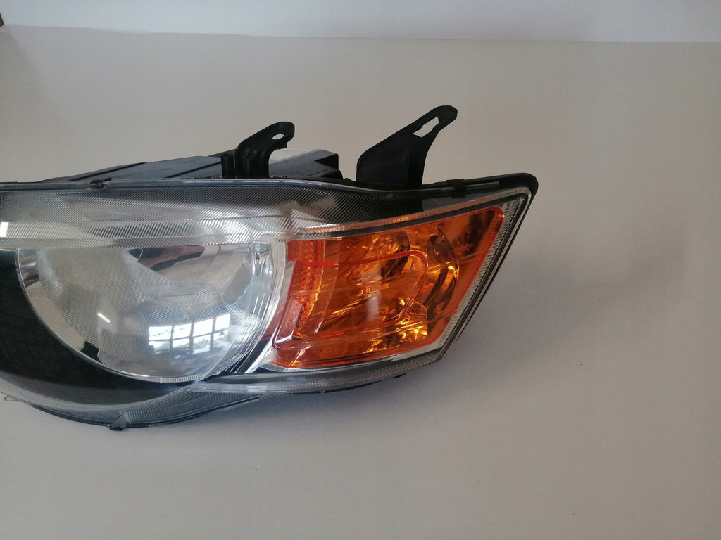 Frontscheinwerfer Mitsubishi Colt VI Links Scheinwerfer Headlight