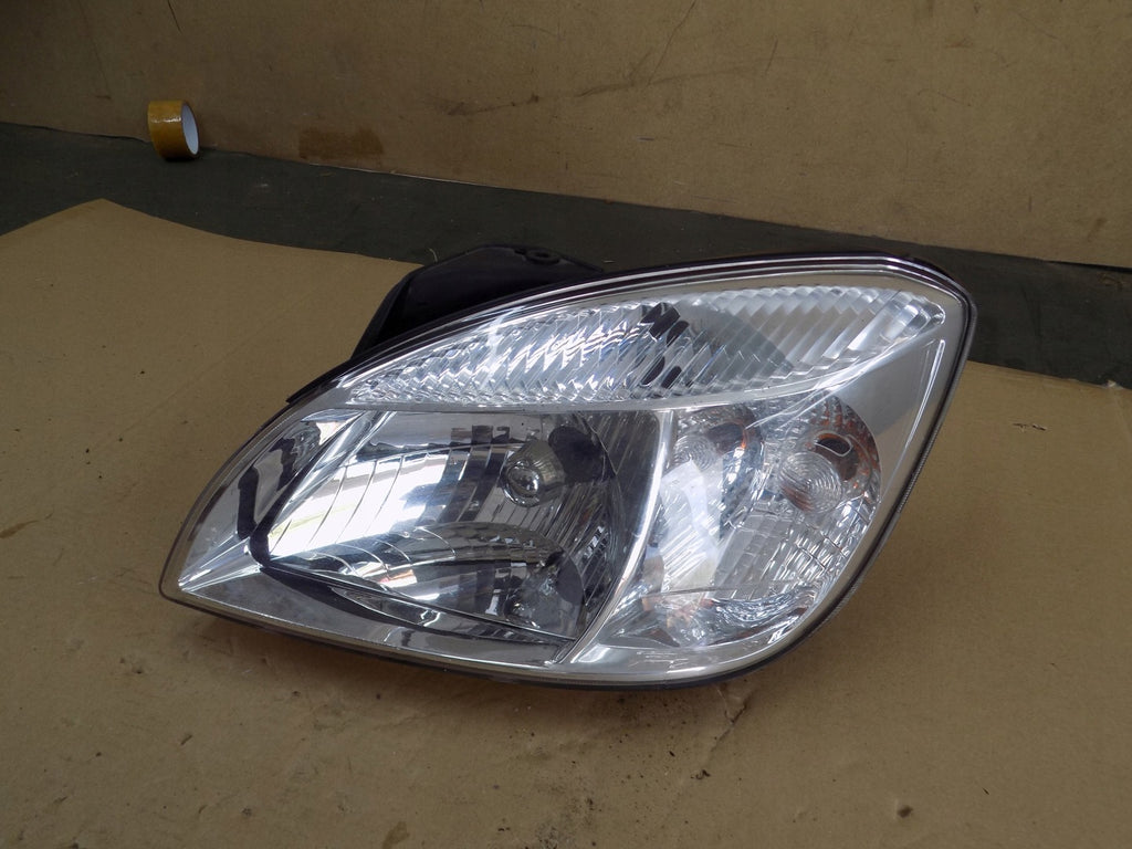 Frontscheinwerfer Kia Rio II 921011G0L Links Scheinwerfer Headlight