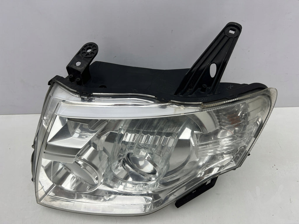 Frontscheinwerfer Mitsubishi Pajero IV 100-67018 Xenon Rechts oder Links