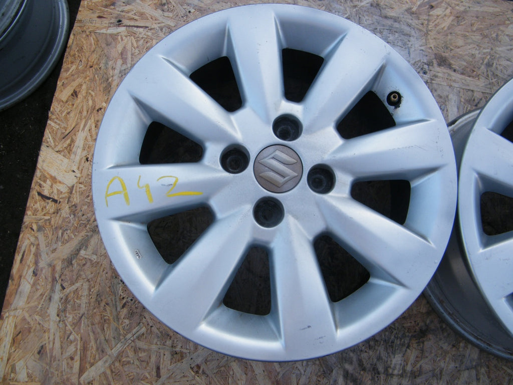 1x Alufelge 15 Zoll 6.0" 4x100 45ET Glanz Silber DH6019 Suzuki Baleno Swift I FEL6556825782dv