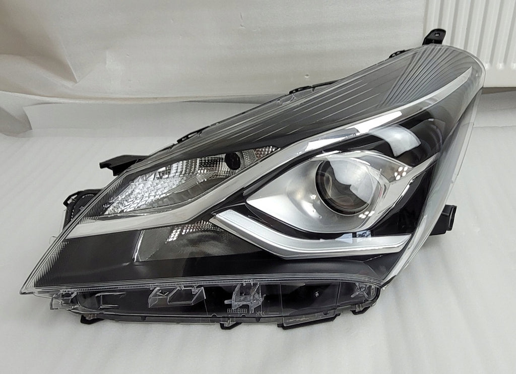 Frontscheinwerfer Toyota Yaris Links Scheinwerfer Headlight SCH7417276250lu