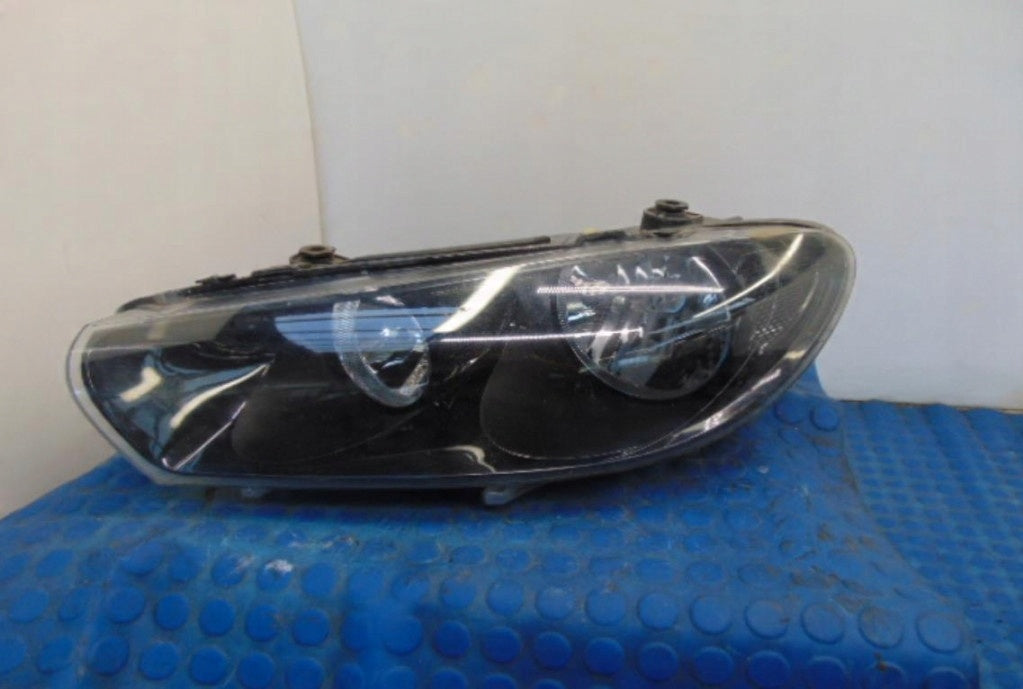 Frontscheinwerfer VW Scirocco 1K8941005 Links Scheinwerfer Headlight
