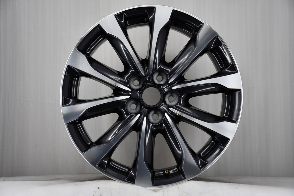 1x Alufelge 18 Zoll 7.0" 5x114.3 50ET Glanz Graphit 9965417080 Mazda Mg FEL4116163001sc