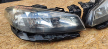 Laden Sie das Bild in den Galerie-Viewer, Frontscheinwerfer Renault Laguna II AMI18736 7701061669 Rechts oder Links SCH7524517158kv