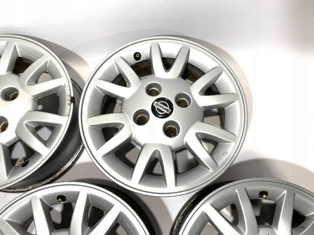 4x Alufelge 15 Zoll 6.0" 4x114.3 45ET Glanz Silber Nissan Primera P11 Almera