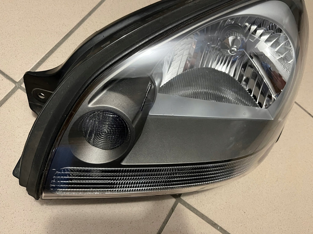 Frontscheinwerfer Hyundai Tucson Links Scheinwerfer Headlight