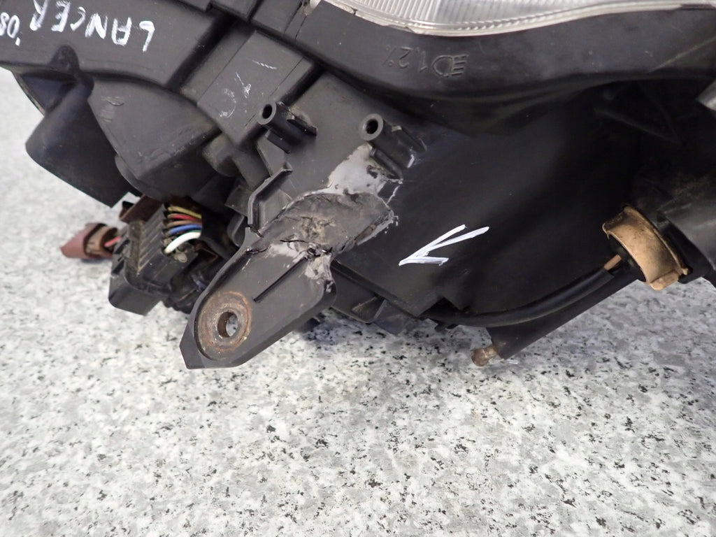 Frontscheinwerfer Mitsubishi Lancer VIII Links Scheinwerfer Headlight