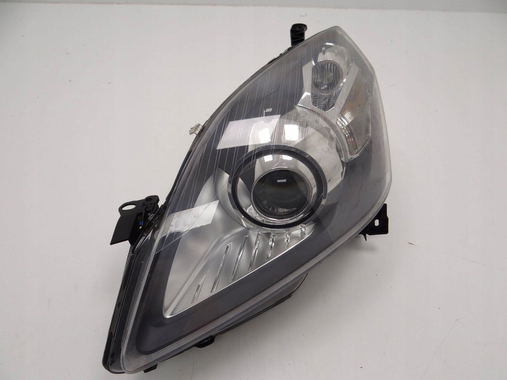 Frontscheinwerfer Opel Zafira B 24451044 0301214281 Xenon Rechts oder Links