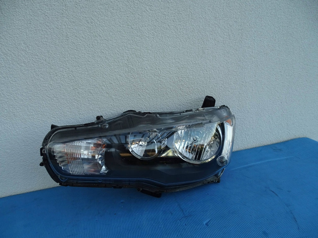 Frontscheinwerfer Mitsubishi Lancer I 8301C339 0510160155 Rechts oder Links