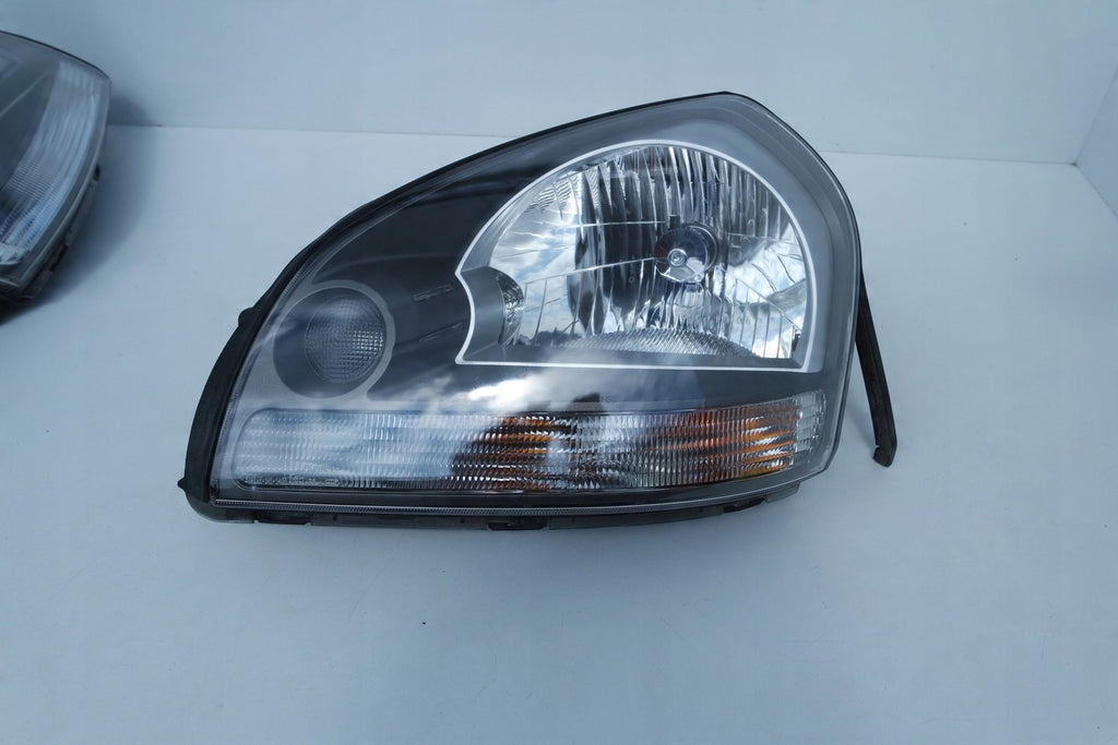 Frontscheinwerfer Hyundai Tucson I 92102-2 LED Ein Stück (Rechts oder Links)
