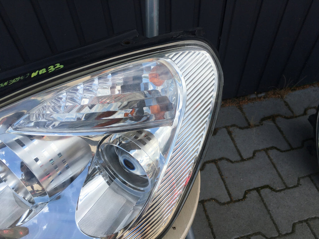 Frontscheinwerfer Kia Carens III Links Scheinwerfer Headlight