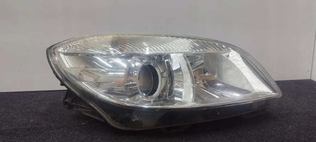 Frontscheinwerfer Skoda Roomster Praktik I 17320302 Links Scheinwerfer Headlight SCH2120937019wf
