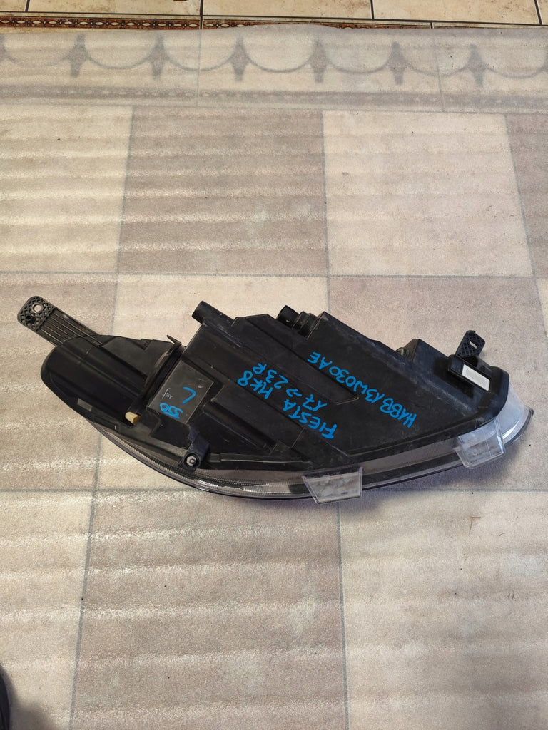 Frontscheinwerfer Ford Fiesta I H1BB13W030AE Links Scheinwerfer Headlight SCH3691124232sz