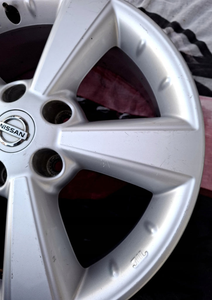 1x Alufelge 17 Zoll 6.5" 5x114.3 40ET Glanz Silber 40300EY17C Nissan Qashqai I FEL9506414545ug
