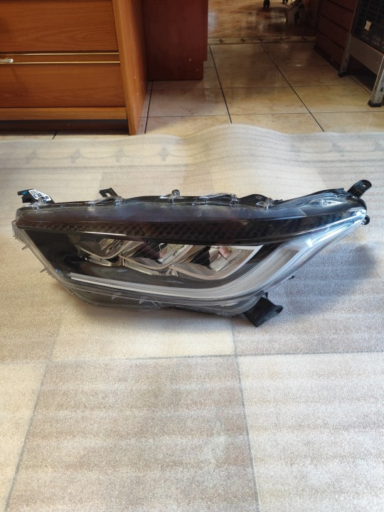 Frontscheinwerfer Toyota Yaris 81150K0080 Links Scheinwerfer Headlight SCH1015975935gs