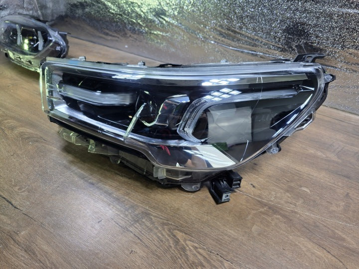 Frontscheinwerfer Toyota Hilux VIII 0K-183 Links Scheinwerfer Headlight SCH1820008801ex