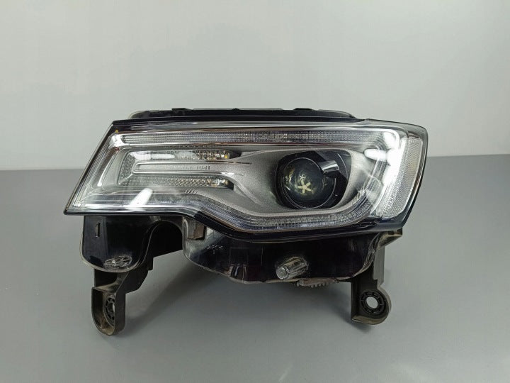 Frontscheinwerfer Jeep Grand Cherokee 68289241AH L90035854 Links Headlight SCH4439726980lu