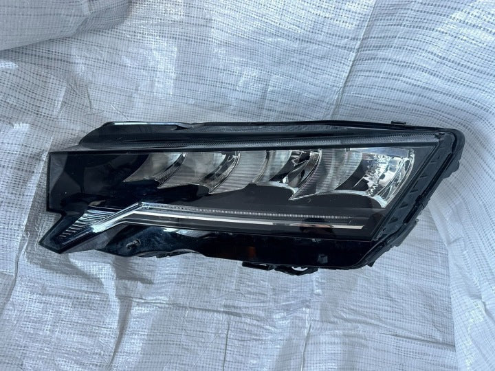 Frontscheinwerfer Skoda Octavia I 5E4941009 D1AF69-C57929 Links Headlight SCH6551919136pg