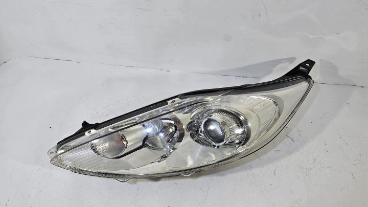 Frontscheinwerfer Ford Fiesta I VII 168574896 Links Scheinwerfer Headlight SCH7141175808dc