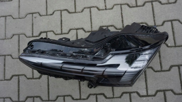 Frontscheinwerfer Volvo 80000401 Links Scheinwerfer Headlight SCH7451738135es